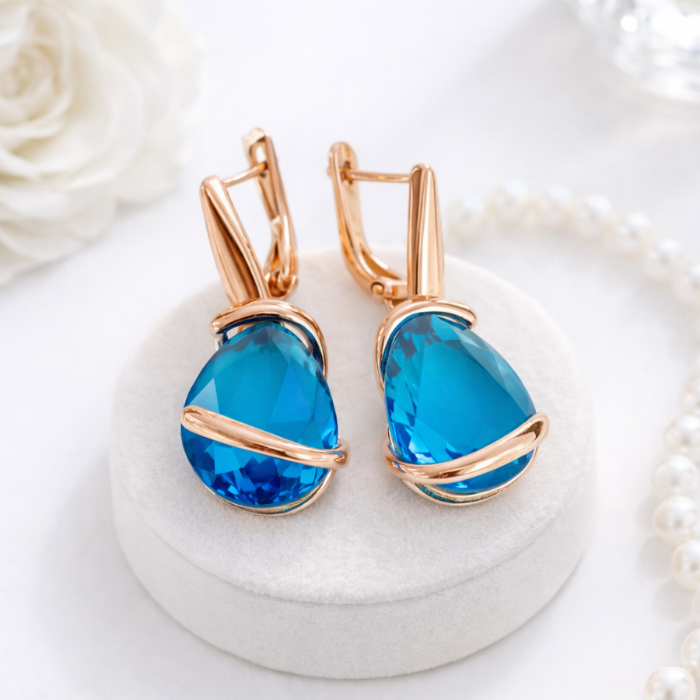 Серьги длинные с крупным камнем Каталог >> Бижутерия >> Ювелирная бижутерия коллекция "Дубай", покрытие позолота, вставка: стекло, цвет: голубой, арт.313.411 313.411