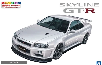 06558  автомобили и мотоциклы  NISSAN BNR34 SKYLINE GT-R V SPEC II White  (1:24) 4905083065587