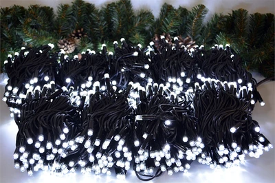 Гирлянда нить уличная 100м. 1000 белых диодов статика, пульт ДУ, черный провод каучук - 10x7602W-H IP65 LEON LED (LIGHT) 20582074