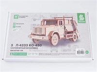 11108  автомобили и мотоциклы  З&amp;Л-4333 КО-450 контейнерный мусоровоз  (1:35) 4694403111089