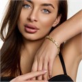 Браслет на руку Каталог >> Бижутерия >> Ювелирная бижутерия коллекция "Дубай" покрытие позолота, вставка: фианиты, цвет: бледно-зеленый и прозрачный, арт.414.410 414.410
