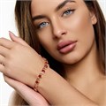 Браслет на руку Каталог >> Бижутерия >> Ювелирная бижутерия коллекция "Дубай" покрытие позолота, вставка: фианиты и цирконы, цвет: малиновый и прозрачный, арт.414.420 414.420