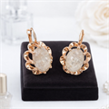 Серьги круглые с крупным камнем Каталог >> Бижутерия >> Ювелирная бижутерия коллекция "Дубай", покрытие позолота, вставка: пластик, цвет: молочный, арт.313.419 313.419