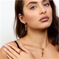Комплект ювелирной бижутерии коллекция "Дубай" серьги, кулон и кольцо 19 р в форме веточки, покрытие позолота, вставка: фианиты и цирконы, цвет: красно-кирпичный и прозрачный, арт.217.492-19 217.492-19