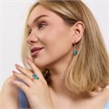 Комплект ювелирной бижутерии коллекция "Дубай" серьги и кольцо 19 р, покрытие позолота, вставка: искусственный кошачий глаз, цвет: голубой, арт.314.985-19 314.985-19