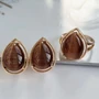 Комплект украшений Каталог >> Бижутерия >> Ювелирная бижутерия Дубайское золото серьги и кольцо, покрытие позолота, вставка: камень кошачий глаз, цвет: коричневый, р р 20, арт.215.064-20 215.064-20