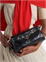 Женская кожаная сумка Prada с пряжками и золотистой фурнитурой 15682925
