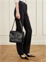 Niki medium crinkled glossed-leather shoulder bag SAINT LAURENT, черный 47345041