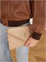 Клатч из кожи Matelassé SAINT LAURENT, бежевый 47323782