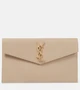 Кожаный клатч Uptown Saint Laurent, бежевый 2110333